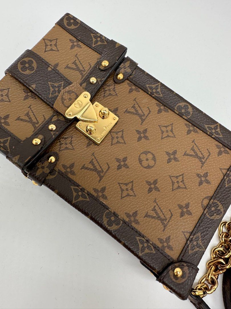 Authentic Louis Vuitton Vertical Trunk (Category: Luxury Bags & Wallets) located in Manila. Submitted by az.purse (Listing ID 1283451293, Image 3). Description: Comes with box, dustbag and entrupy certificate. 9/10 condition.
