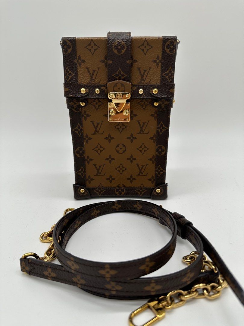 Authentic Louis Vuitton Vertical Trunk (Category: Luxury Bags & Wallets) located in Manila. Submitted by az.purse (Listing ID 1283451293, Image 1). Description: Comes with box, dustbag and entrupy certificate. 9/10 condition.