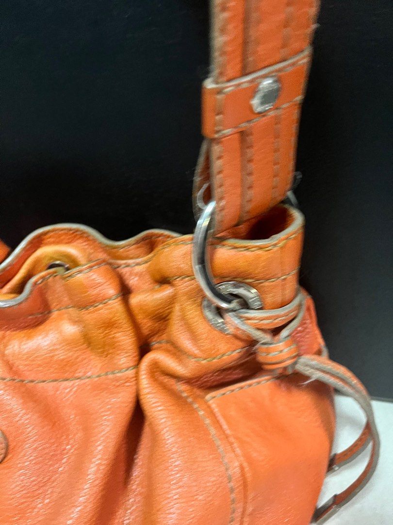 Authentic Tods Bucket Shoulder Bag (Category: Luxury Bags & Wallets) located in Quezon City. Submitted by bebegaze (Listing ID 1283496433, Image 2). Description: Authentic Tods bag Preloved so expect signs of use such as rubs, discoloration and ink stain inside. Very soft leather. Super nice material. .
