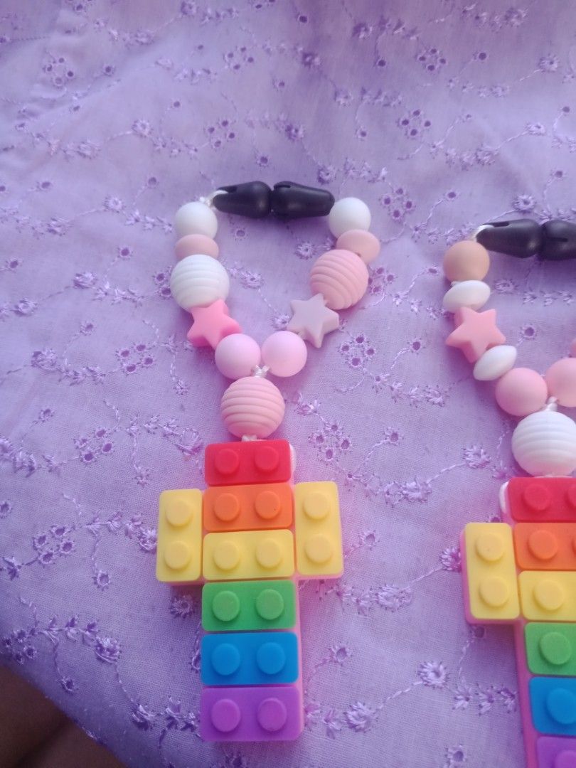 First Baby Decade Teething Chews life rosary (Category: Soothers & Pacifiers) located in Manila. Submitted by billionare (Listing ID 1283637339, Image 2). Description: This beautiful silicon rosary is sure to bring joy to your home.. this teething toy is not only soothing for your little one but it is also sure to help build wonder and love for the rosary.. watching your child hold this silicone rosary is like watching them to hold hand of Mary. 