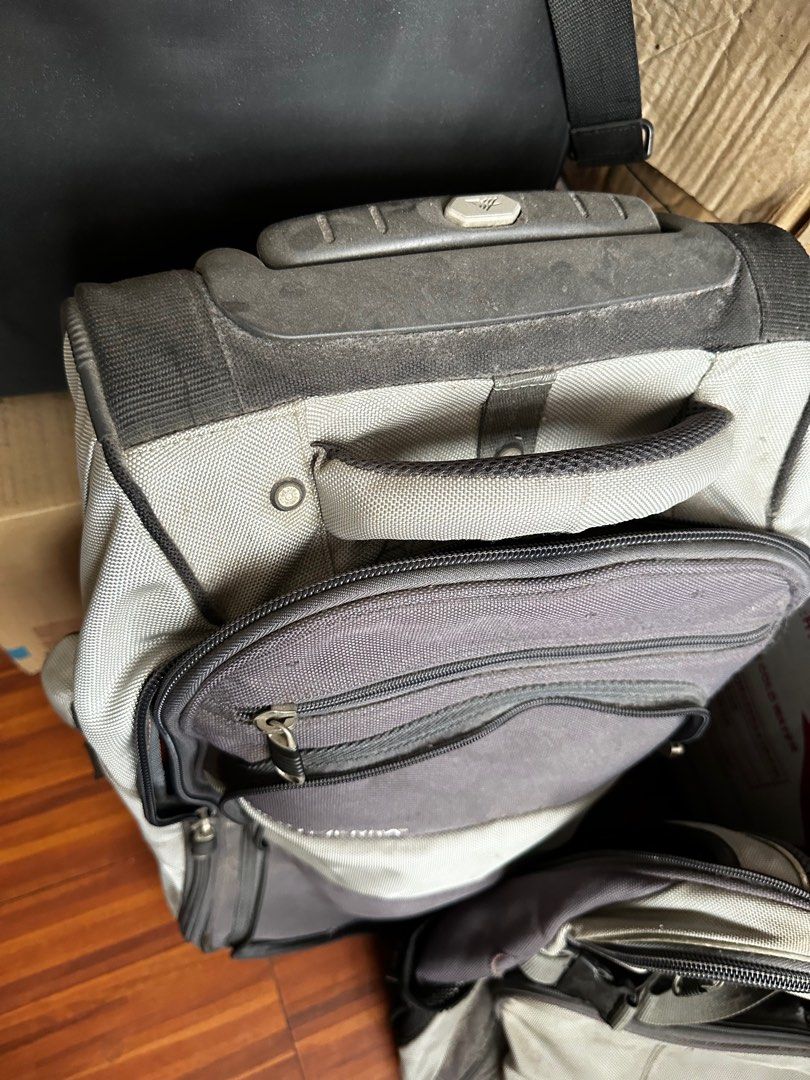 High Sierra Backpack & Luggage (Category: Backpacks) located in Manila. Submitted by loudanros (Listing ID 1283479468, Image 3). Description: Backpack can attach to the luggage trolley before but the zipper attachment can’t attach anymore I think so just use as a separate bag. Inside is durable :) Sold as a pair Trolley 52cm Ht. 40cm length 20cm width.