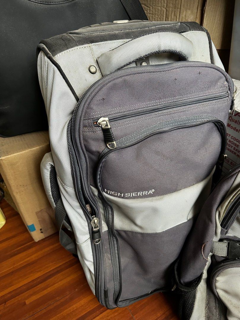 High Sierra Backpack & Luggage (Category: Backpacks) located in Manila. Submitted by loudanros (Listing ID 1283479468, Image 1). Description: Backpack can attach to the luggage trolley before but the zipper attachment can’t attach anymore I think so just use as a separate bag. Inside is durable :) Sold as a pair Trolley 52cm Ht. 40cm length 20cm width.