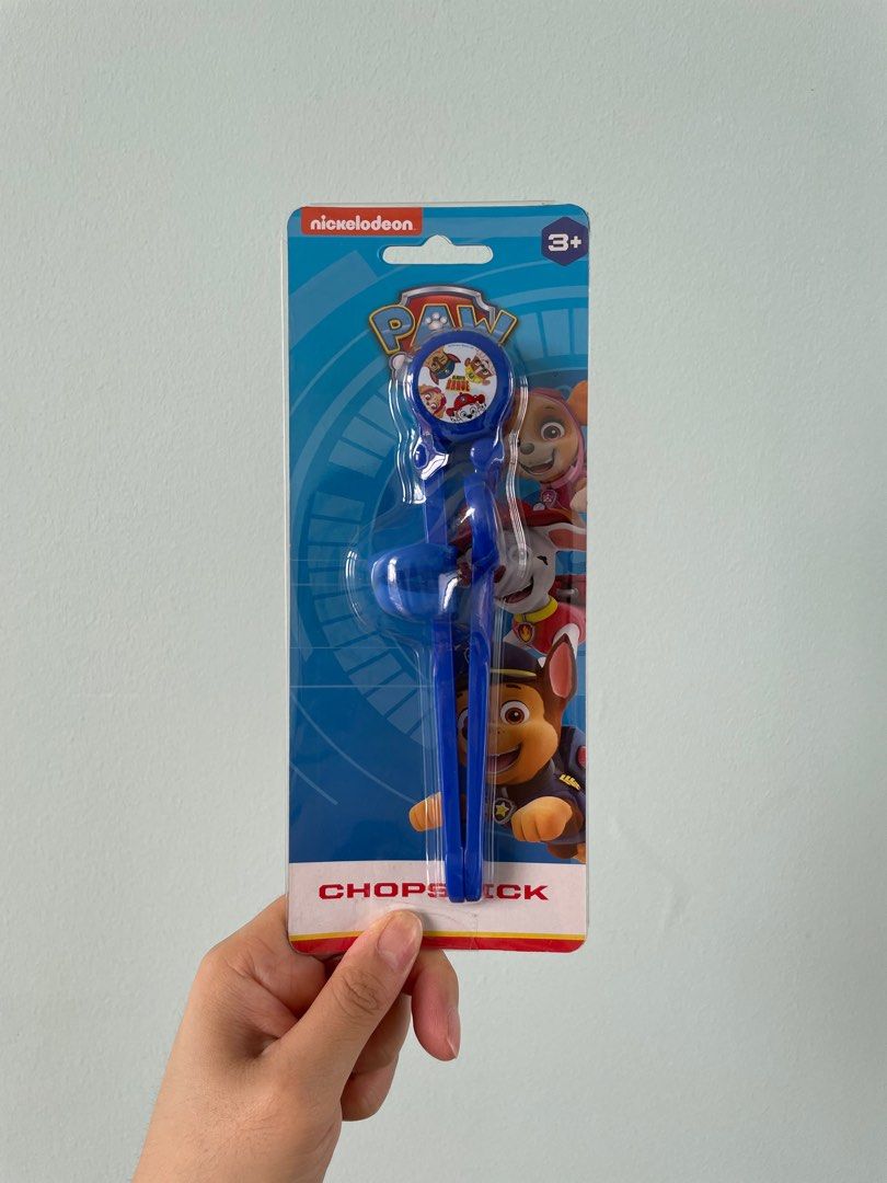 Paw Patrol Training Chopsticks (Category: Weaning & Toddler Feeding) located in Quezon City. Submitted by girlwhohaseverything (Listing ID 1283563636, Image 1). Description: Teach kids how to use chopsticks with this trainer!.