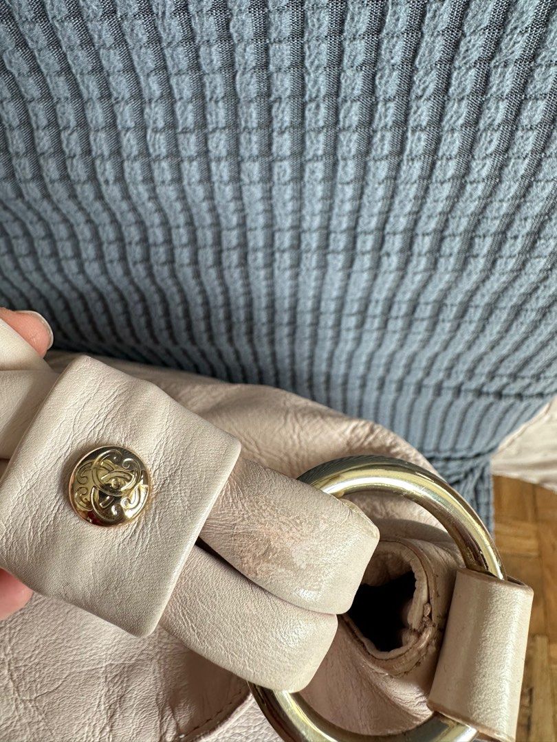 Shanghai Tang Jade Sling (Category: Luxury Bags & Wallets) located in Mandaluyong City. Submitted by cdt00 (Listing ID 1283545069, Image 3). Description: I’m Decluttering the bags I no longer use. This is a Shanghai Tang Jade sling bag with oversized tassels and Chinese knots made with soft nappa leather RFS: Decluttering to buy a new one MOP: BPI/UB/Chinabank/Gcash Delivery: LBC / Grab shouldered by buyer Pickup/Meetup: Pioneer Highlands Mandalu