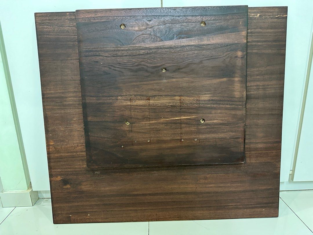 Solid Wood Tabletop (Category: Tables & Sets) located in Singapore. Submitted by hotwt (Listing ID 1283575752, Image 2). Description: Solid Wood Tabletop Maroon color 90cm by 80cm 2cm thick Reinforced with a smaller pad Holes are due to screwing to table leg, controller and tray.