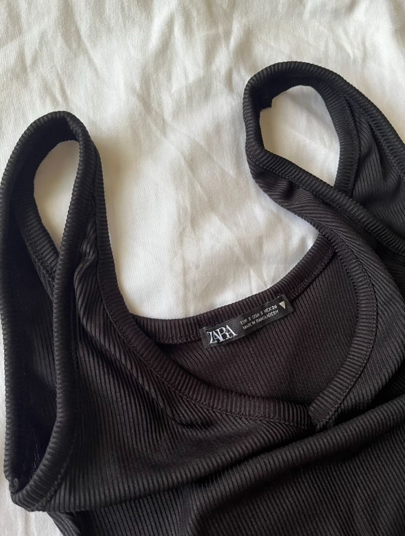 ZARA Black Deep V-neck Top ⭐️ (Category: Sleeveless) located in Cainta. Submitted by pt______ (Listing ID 1283515385, Image 2). Description: Cropped, perfect for petite girls. Just not my style. .
