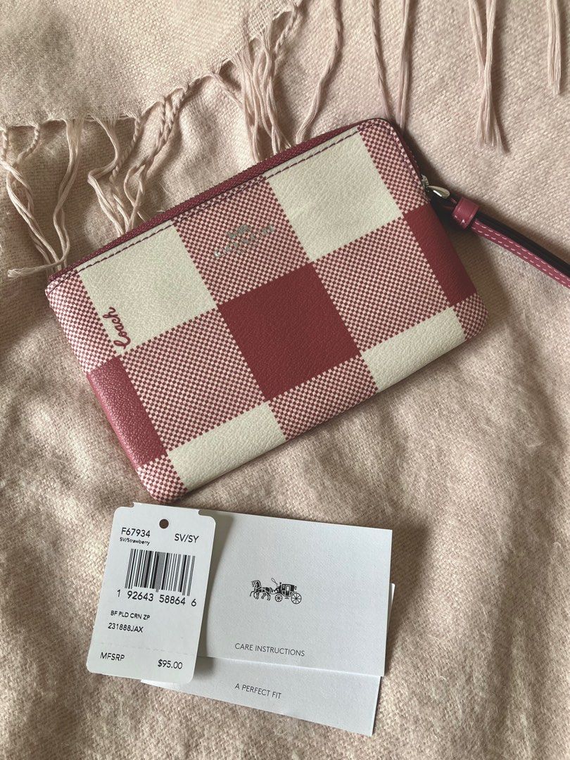 Authentic Coach Corner Zip Wristlet in Buffalo Plaid Print (Category: Wallets & Card holders) located in Quezon City. Submitted by reysiyel (Listing ID 1285914020, Image 3). Description: Authentic Coach Corner Zip Wristlet in Buffalo Plaid Print from US, completely new with tags and plastic packaging(as shown) RFS: Received as gift(s) from US relatives, I already have other Coach wristlets Selling as is, all pertinent photos shown to manage expec