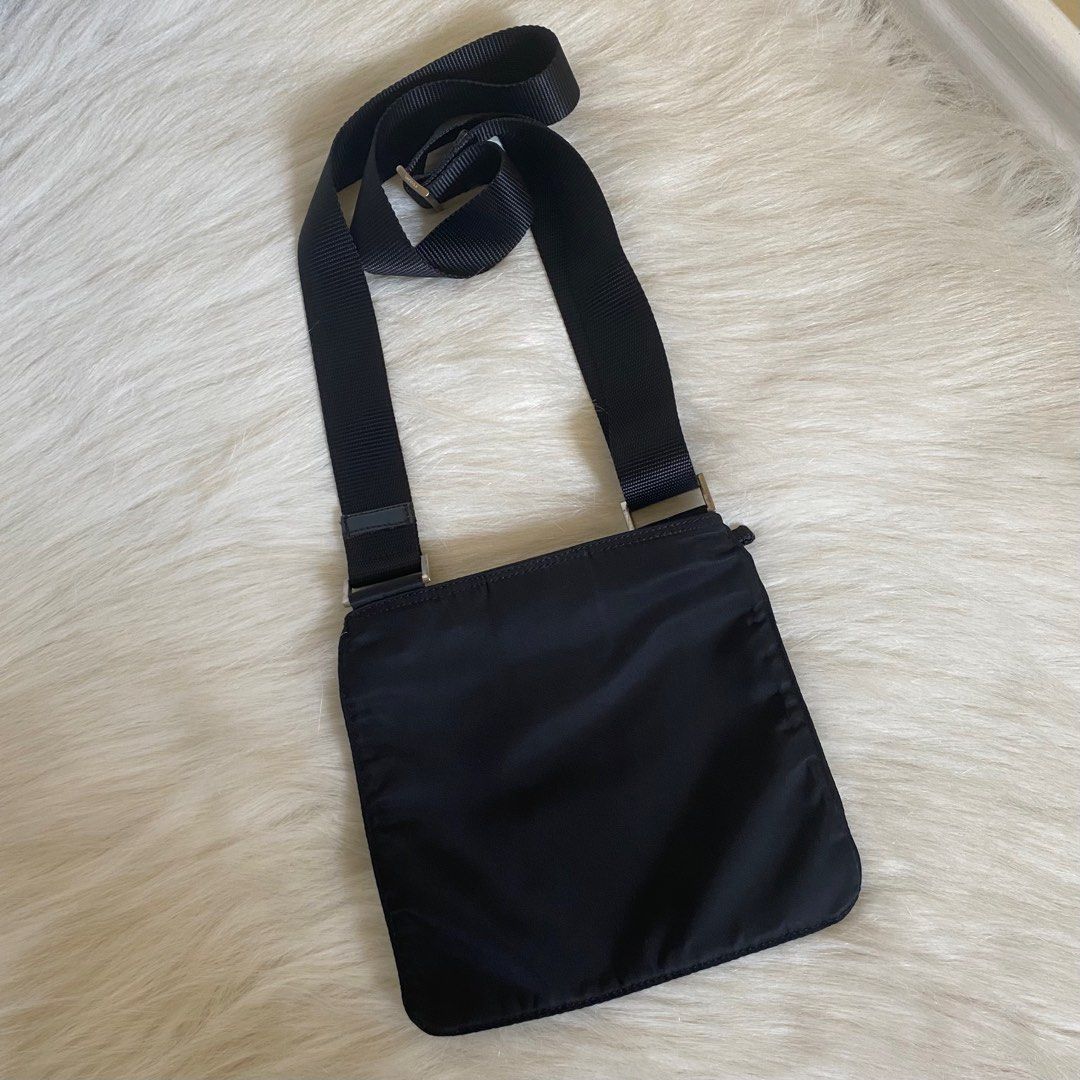 Authentic Like New Prada Black Nylon Slingbag Small (Category: Luxury Bags & Wallets) located in Quezon City. Submitted by tokyoluxestuff2013 (Listing ID 1285889184, Image 3). Description: Price fixed Like New Prada Black Nylon Slingbag Small Excellent condition No discoloration No inclusion Size approx. 21cm W x 19cm H Onhand Meet up for sure buyer only QC Shipping via LBC/ Grab/ Lalamove Add shipping fee.
