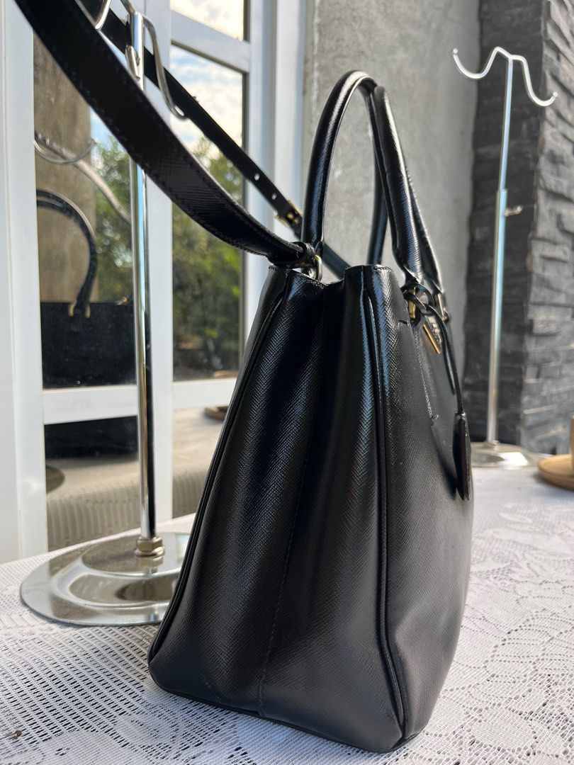 authentic prada safiano two way shoulder hand bag (Category: Luxury Bags & Wallets) located in Cabanatuan. Submitted by lambertodette (Listing ID 1285878939, Image 2). Description: authentic prada safiano two way shoulder hand bag. customized recolored pink to black excellence condition .