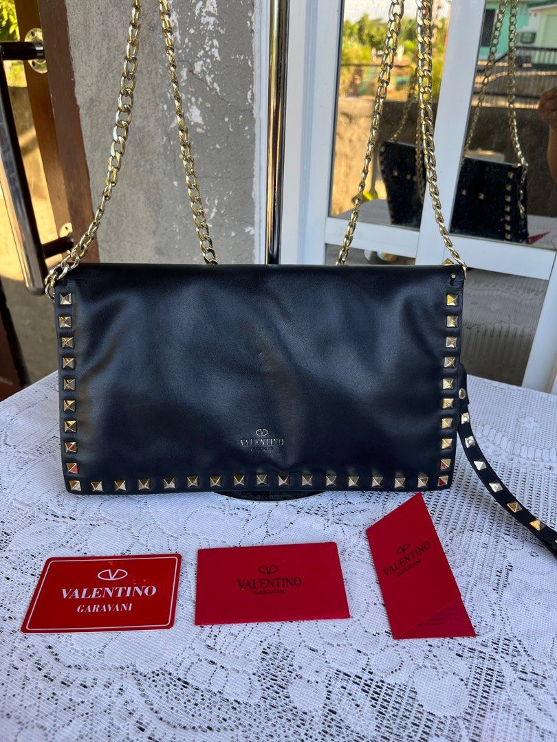 authentic valentino garavani (Category: Luxury Bags & Wallets) located in Cabanatuan. Submitted by lambertodette (Listing ID 1285882673, Image 1). Description: authentic valentino garavani rockstudded clutch sling wristlet leather .