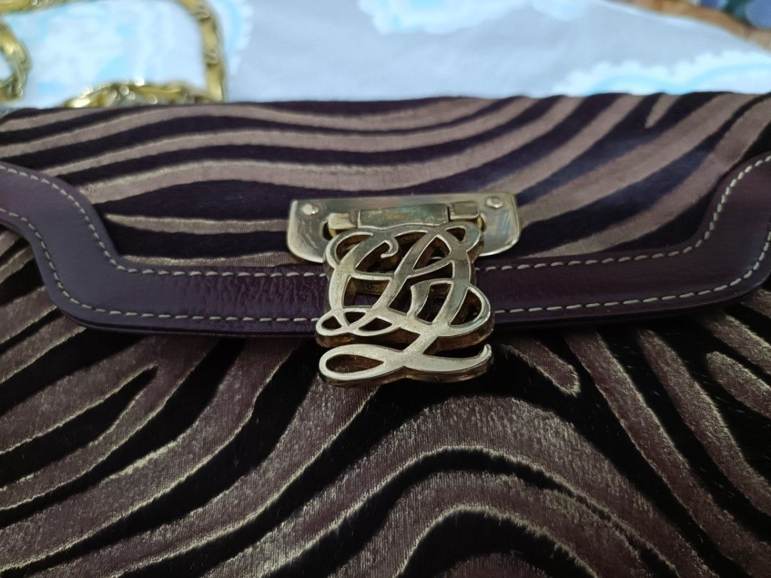 Authentic Vintage Louis Quatorze Sling Bag (Category: Shoulder Bags) located in Taguig. Submitted by edellede (Listing ID 1285904866, Image 3). Description: For Sale! Preloved Louis Quatorze sling bag not adjustable but you can remove the chain to use it as a clutch Combination of leather and velvet Dimensions are shown in photos #7 and #8 Kindly also check the last 2 photos for some minor flaws RFS: Decluttering preferably meet up but can also s