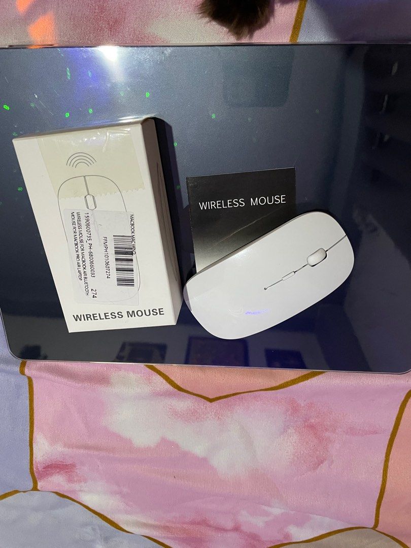 Wireless mouse set for Macbook and other lappy's (Category: Mouse & Mousepads) located in Manila. Submitted by yangyang_11 (Listing ID 1285992248, Image 3). Description: Seldom use and already upgraded to magic mouse. Works perfectly and smooth no delays (bluetooth and dongle). Get both. White and baby pink ✨ MOP: Maya/Gcash.