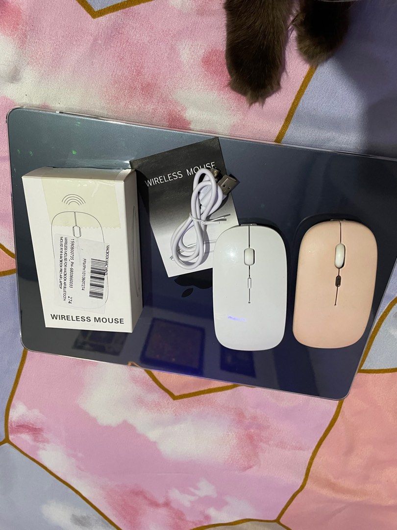 Wireless mouse set for Macbook and other lappy's (Category: Mouse & Mousepads) located in Manila. Submitted by yangyang_11 (Listing ID 1285992248, Image 1). Description: Seldom use and already upgraded to magic mouse. Works perfectly and smooth no delays (bluetooth and dongle). Get both. White and baby pink ✨ MOP: Maya/Gcash.