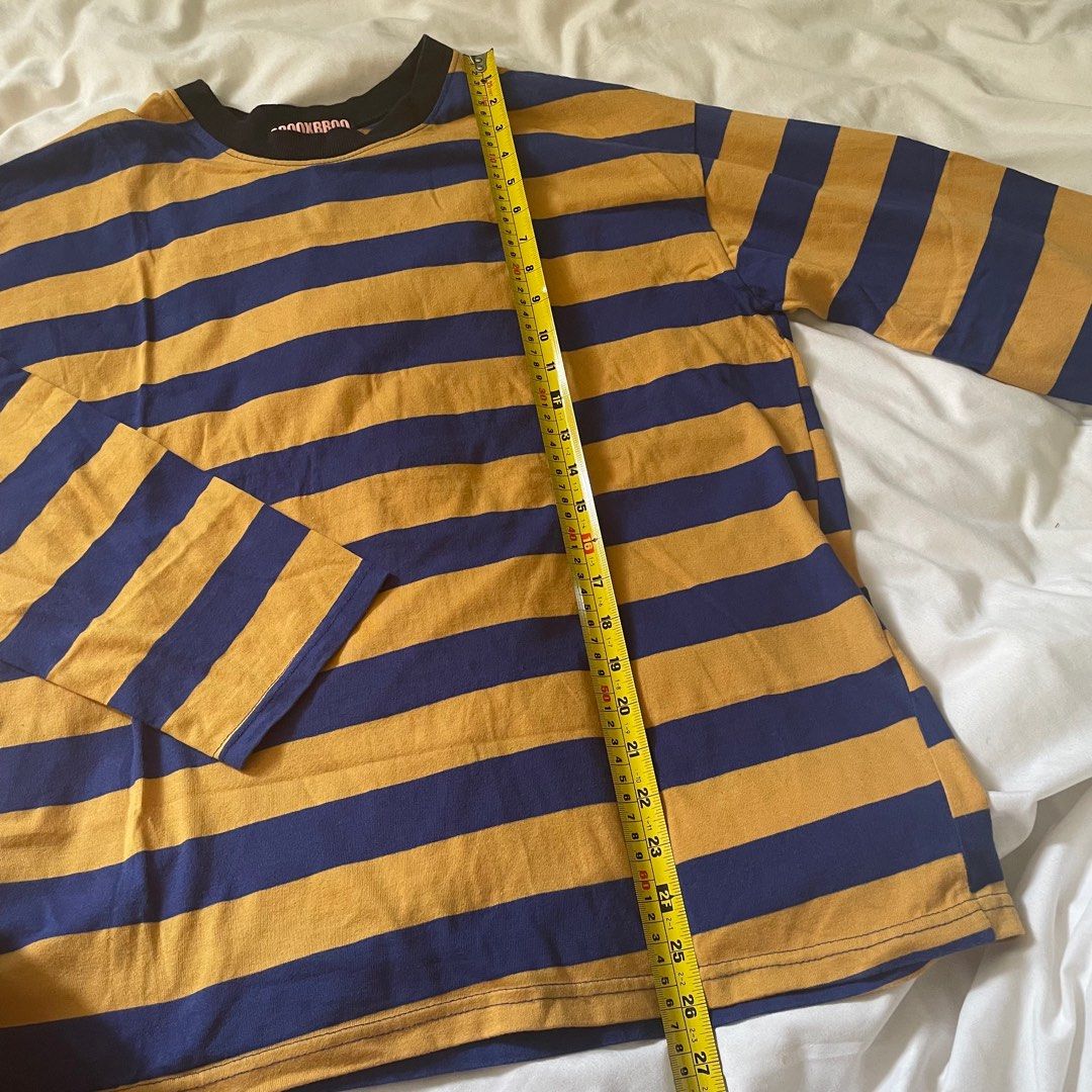 blue and yellow long sleeve shirt