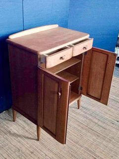 Console Cabinet 24”L x 14”W x 32”H  Solid wood 2 wooden doors 2 pullout drawers In good condition