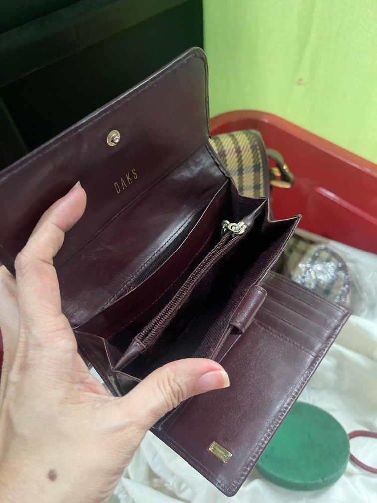Daks - Sling Bag with Wallet Bundle Sale (Category: Luxury Bags & Wallets) located in Rizal. Submitted by preloved1143 (Listing ID 1285856795, Image 3). Description: Preloved Rare items Authentic Daks With signs of usage but no cracks Bag 1800 Wallet 1200.