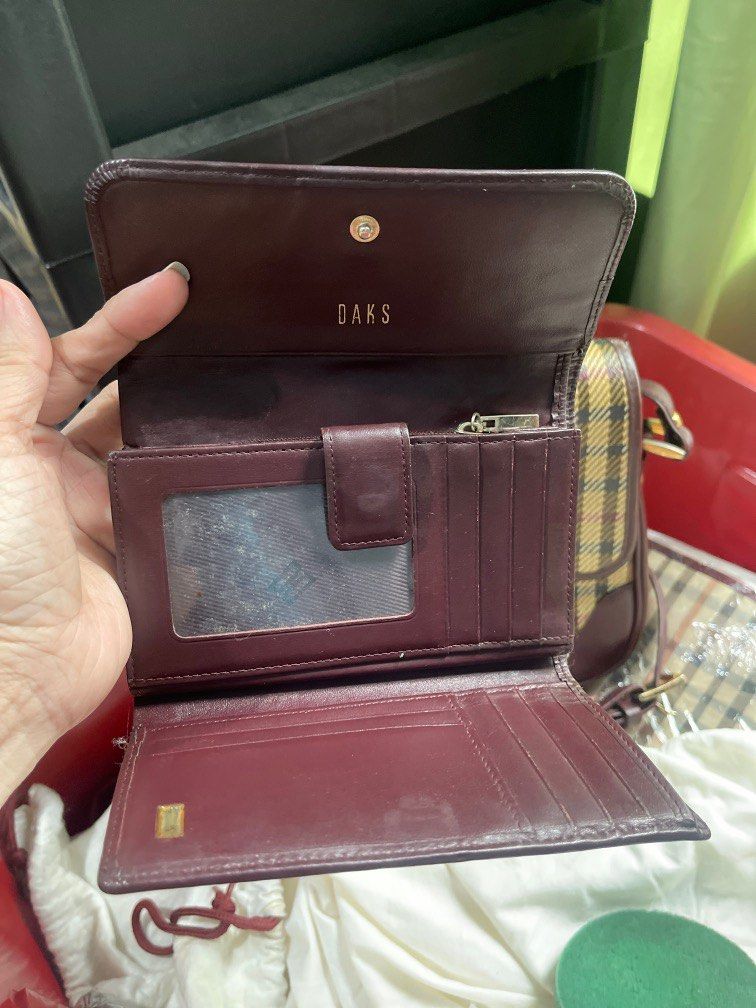 Daks - Sling Bag with Wallet Bundle Sale (Category: Luxury Bags & Wallets) located in Rizal. Submitted by preloved1143 (Listing ID 1285856795, Image 2). Description: Preloved Rare items Authentic Daks With signs of usage but no cracks Bag 1800 Wallet 1200.