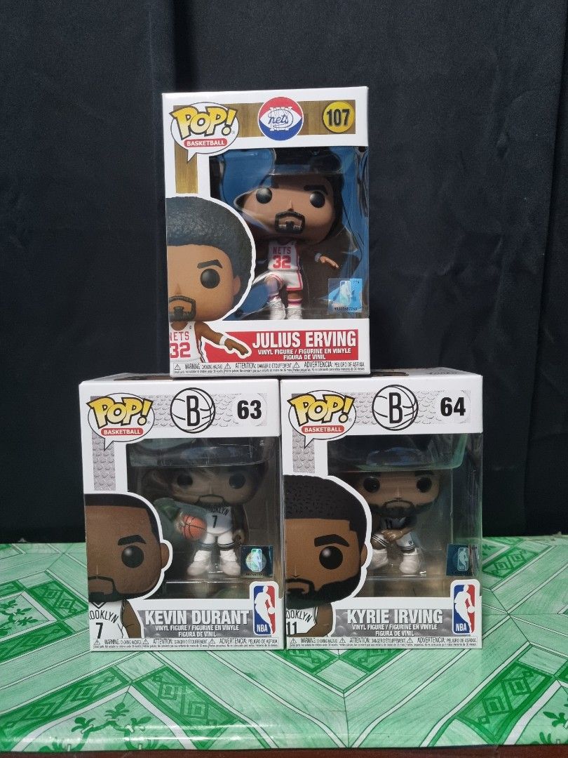 Funko Pop - NBA Nets Set (Category: Designer & Blind Box Toys) located in Quezon City. Submitted by justindahan (Listing ID 1285928839, Image 1). Description: Funko Pop - NBA 63 Kevin Durant 64 Kyrie Irving 107 Julius Erving *Items are located at Congressional Ave QC, near Global Gas Station *Pops and boxes are 8.5 to 9.5/10 based on my judgment. Additional photos will be provided. *Pops come with Protectors. *Shipping is buyer's expense. *MoP - 