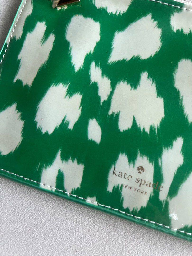 Kate spade flat pouch (Category: Luxury Bags & Wallets) located in Makati City. Submitted by nmvs1 (Listing ID 1285869629, Image 3). Description: Authentic Kate spade Flat pouch with zip closure Dimensions 8.5 inches wide by 5 inches height Never used just stored.