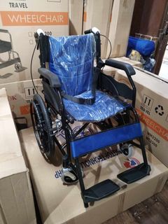 Matte blue travel wheel chair
