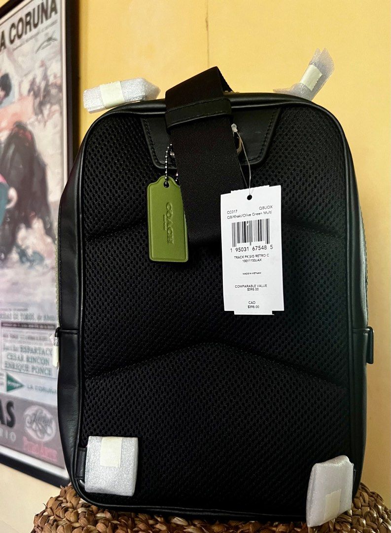 TRACK PACK IN SIGNATURE CANVAS WITH COACH PATCH (Category: Luxury Bags & Wallets) located in Bacoor. Submitted by boutiquevilladulce (Listing ID 1285883177, Image 3). Description: •Original/Authentic Coach Crossbody bag •Bought in US • SRP $398CAD •Khaki/Olivegreen •Signature coated canvas and smooth calf leather • Inside zip pocket | Zip closure, fabric lining • Outside pocket with speedclip closure • Adjustable shoulder strap for crossbody wear