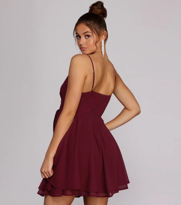 Windsor chiffon flow skater dress (Category: Dresses) located in Baliuag. Submitted by allthingsambrit (Listing ID 1285854911, Image 3). Description: Go with the party flow in this chiffon skater dress! It has a wrap bodice with a deep V neckline, adjustable spaghetti straps, and an exposed back zipper closure. A high waist seam leads to a wrapped and layered skater skirt. Dress has a full lining and is composed of a chiffon fabric with no stretc