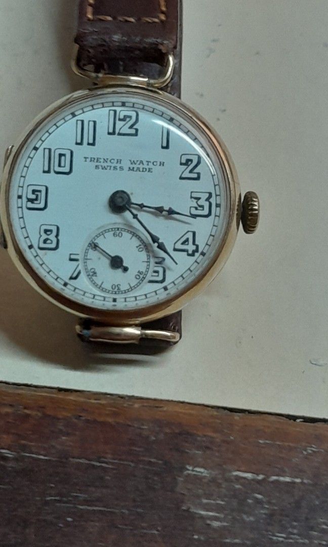 A Trench watch gold of 1950s period