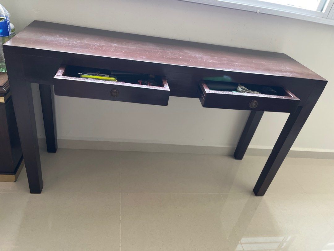 Console table (Category: Tables & Sets) located in Singapore. Submitted by mkaeren (Listing ID 1286044118, Image 3). Description: Solid wood antique study table with 2 drawers. Dimensions (WxDxH) 135”x40”x78”. Self-pickup only (heavy) or arrange your own transport. .