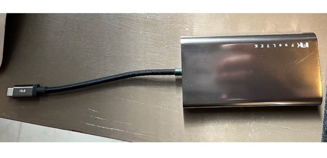Feeltek Portable 10-in-1 USB-C Hub (Category: Cables & Adaptors) located in Las Pinas. Submitted by r2rivs (Listing ID 1286028546, Image 1). Description: Authentic Feeltek Like new, slightly used but with minor scratches. Used inside the house only. Original price: Php4k+ Additional photos upon request.