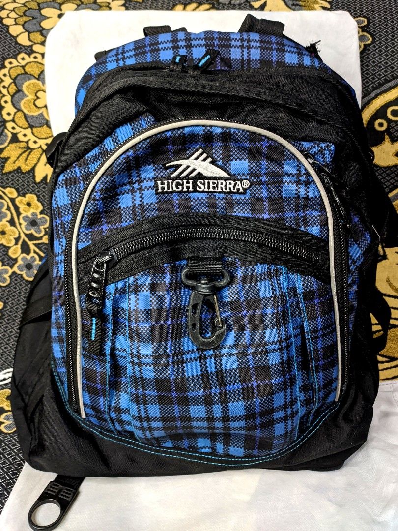 High Sierra Backpack (Category: Backpacks) located in Manila. Submitted by jorjannah (Listing ID 1286099353, Image 1). Description: Store bought High Sierra Plaid Backpack. Kayo po magiging 2nd owner nito. 4 compartments Very durable and spacious Clean inside out All zippers working well. *minor stain at the bottom part of bag *Minor rip at the left shoulder pad, kindly refer to last photo. Dimensions: approx 48 x 32 x 15 cm $hopee check-out avai