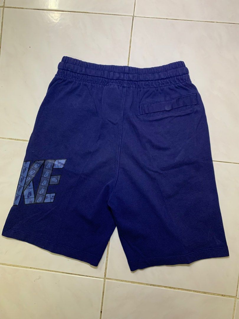 Nike sweatpants short length sales