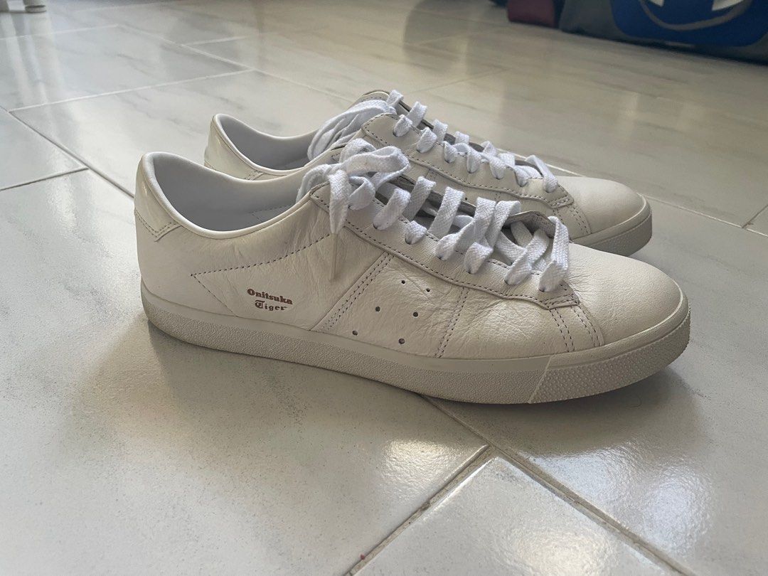 Onitsuka Tiger White shoes (Category: Sneakers) located in Singapore. Submitted by okkkqqq (Listing ID 1286079413, Image 2). Description: Bought in KL for >$200, worn once selling because I have bunions and these are too narrow. Soles are lightly dirty and leather upper is slightly wrinkled but overall almost new. .