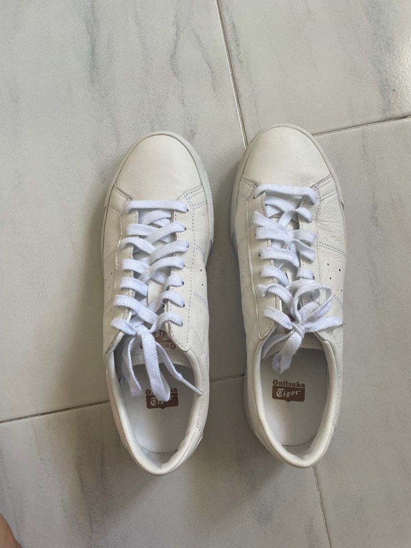 Onitsuka Tiger White shoes (Category: Sneakers) located in Singapore. Submitted by okkkqqq (Listing ID 1286079413, Image 3). Description: Bought in KL for >$200, worn once selling because I have bunions and these are too narrow. Soles are lightly dirty and leather upper is slightly wrinkled but overall almost new. .