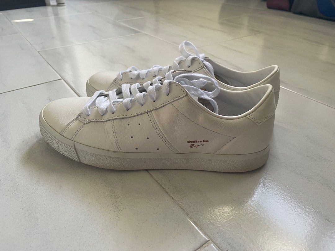 Onitsuka Tiger White shoes (Category: Sneakers) located in Singapore. Submitted by okkkqqq (Listing ID 1286079413, Image 1). Description: Bought in KL for >$200, worn once selling because I have bunions and these are too narrow. Soles are lightly dirty and leather upper is slightly wrinkled but overall almost new. .