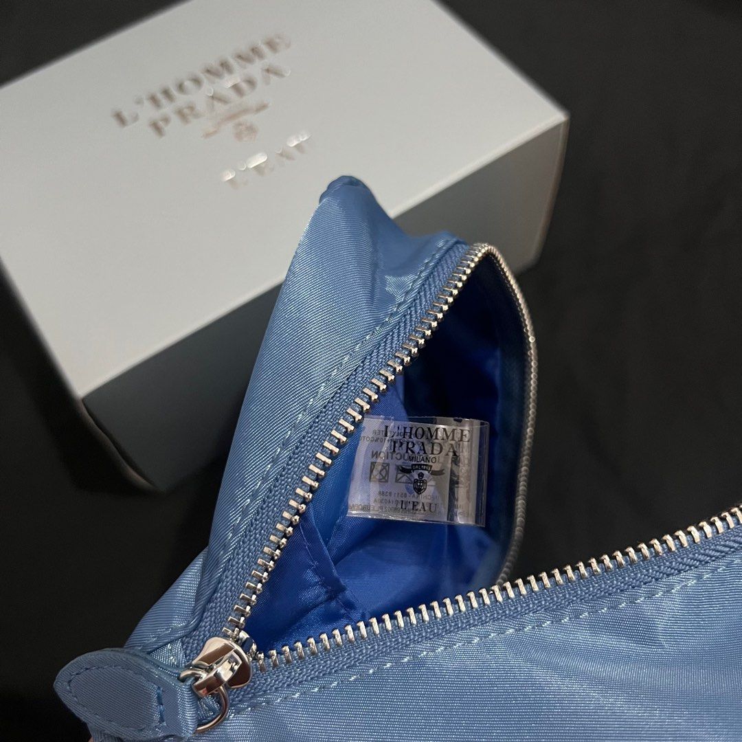 Original Prada Pouch 💙 (Category: Luxury Bags & Wallets) located in Rizal. Submitted by thetopspotfashionboutique (Listing ID 1286162732, Image 3). Description: - trousse de toilet - comes with box - original complimentary gift from the brand .