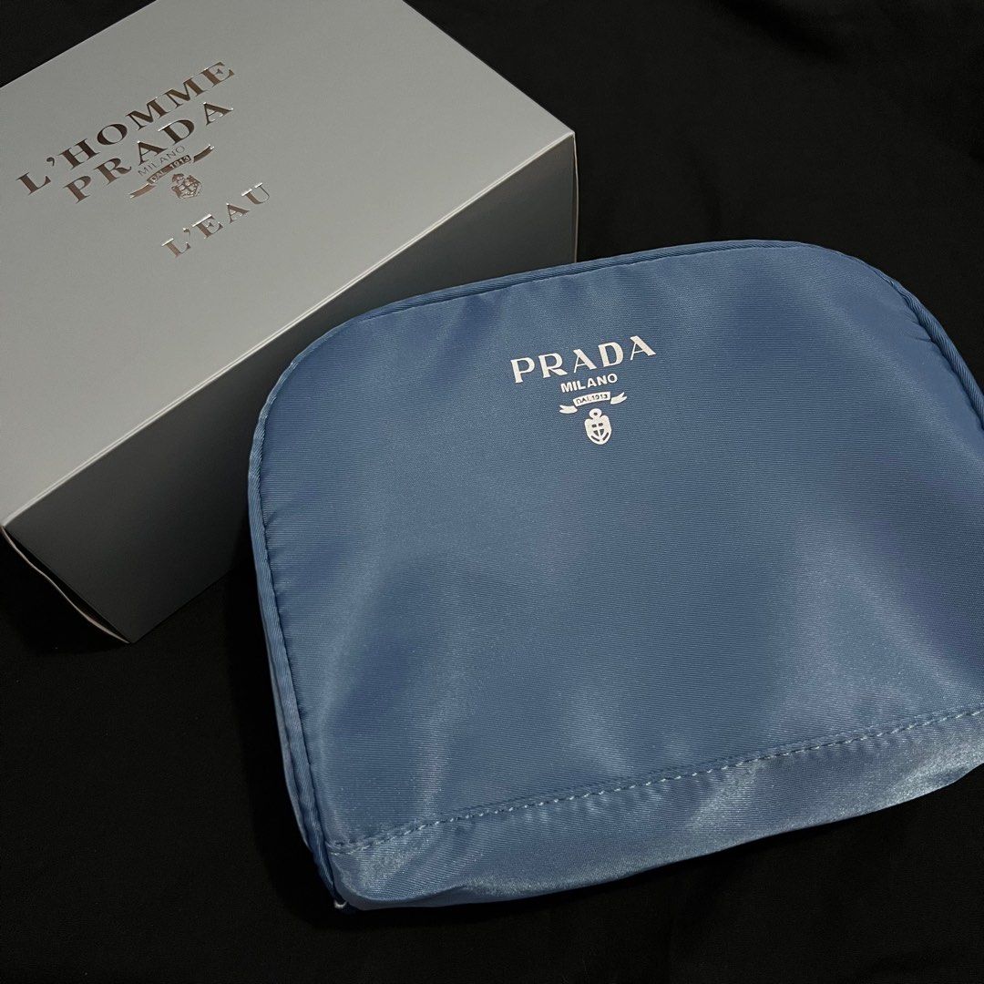 Original Prada Pouch 💙 (Category: Luxury Bags & Wallets) located in Rizal. Submitted by thetopspotfashionboutique (Listing ID 1286162732, Image 1). Description: - trousse de toilet - comes with box - original complimentary gift from the brand .
