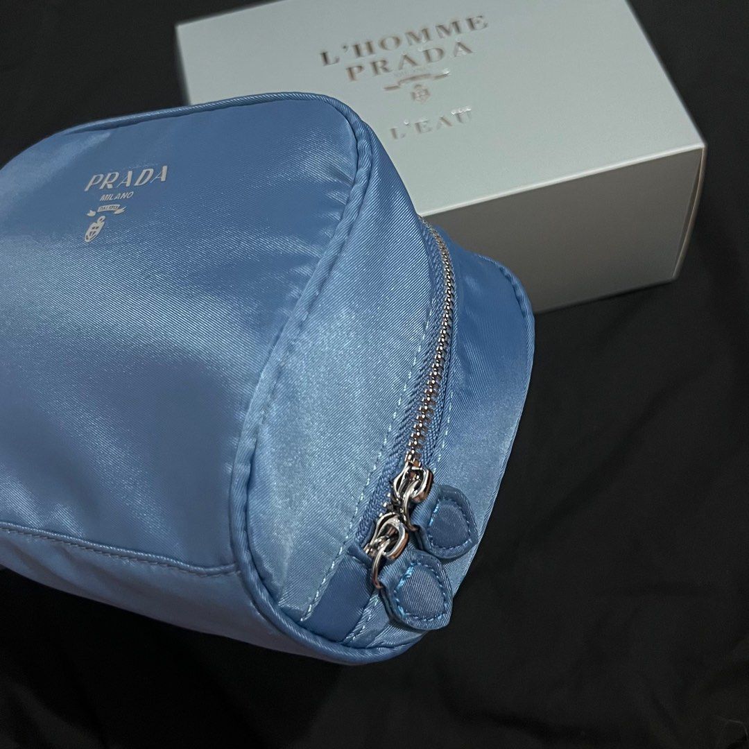 Original Prada Pouch 💙 (Category: Luxury Bags & Wallets) located in Rizal. Submitted by thetopspotfashionboutique (Listing ID 1286162732, Image 2). Description: - trousse de toilet - comes with box - original complimentary gift from the brand .
