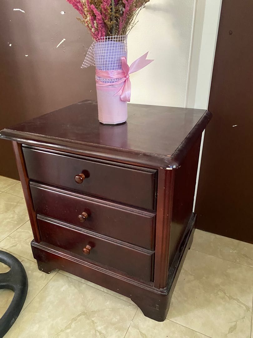 Bedside Table / dresser wood (Category: Tables & Sets) located in Mandaluyong City. Submitted by dobypreloved (Listing ID 1286207549, Image 2). Description: Flaws seen in pic Really good quality and sturdy, just has a few scratches as seen in the photos Pickup in Batino SLEX (ciudad de calamba).