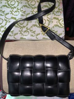 Black leather Bottega Veneta sling bag dupe by Coco x Fifi