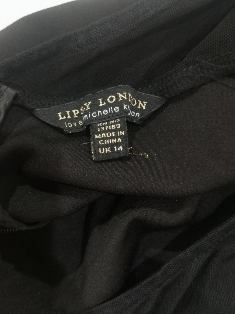 Black short sleeve dress (Category: Dresses) located in Quezon City. Submitted by random-11731 (Listing ID 1286225820, Image 3). Description: , 👍Used few times only. 👍 👍Bought in London 👍Can fit small to medium 👍Brand names. Lipsy London.