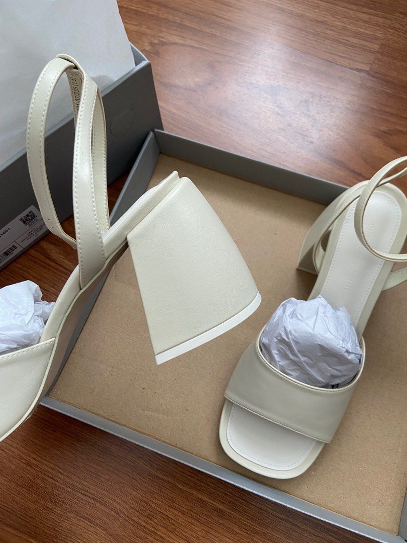 Charles and Keith: Chunky Block Heel Sandals (Category: Heels) located in Manila. Submitted by auriellee (Listing ID 1286210412, Image 3). Description: NEVER USED! With box - perfect for events / weddings Color: Chalk Rounded square toes Adjustable ankle straps Chunky block heels Breathable lining Material: Faux leather Heel height (cm): 8 RFS: ended up using a different pair of shoes on my wedding :D.