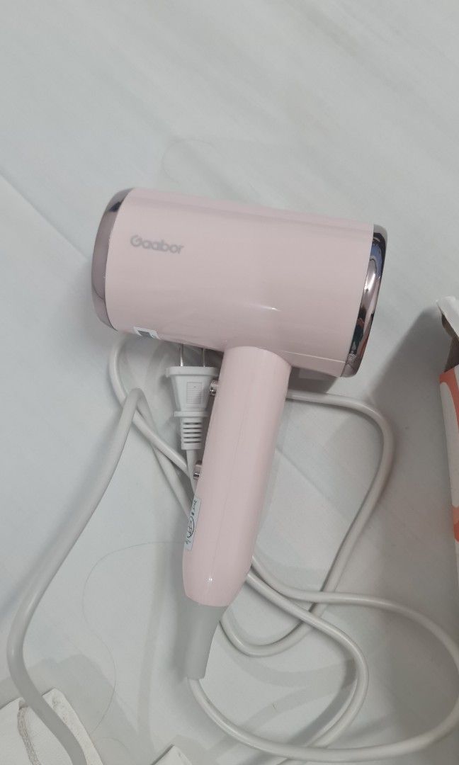 Gaabor pink hair dryer (Category: Hair) located in Manila. Submitted by lcadiente (Listing ID 1286185779, Image 3). Description: Selling Gaabor hair dryer, used twice, for 300 pesos. stilll w box.