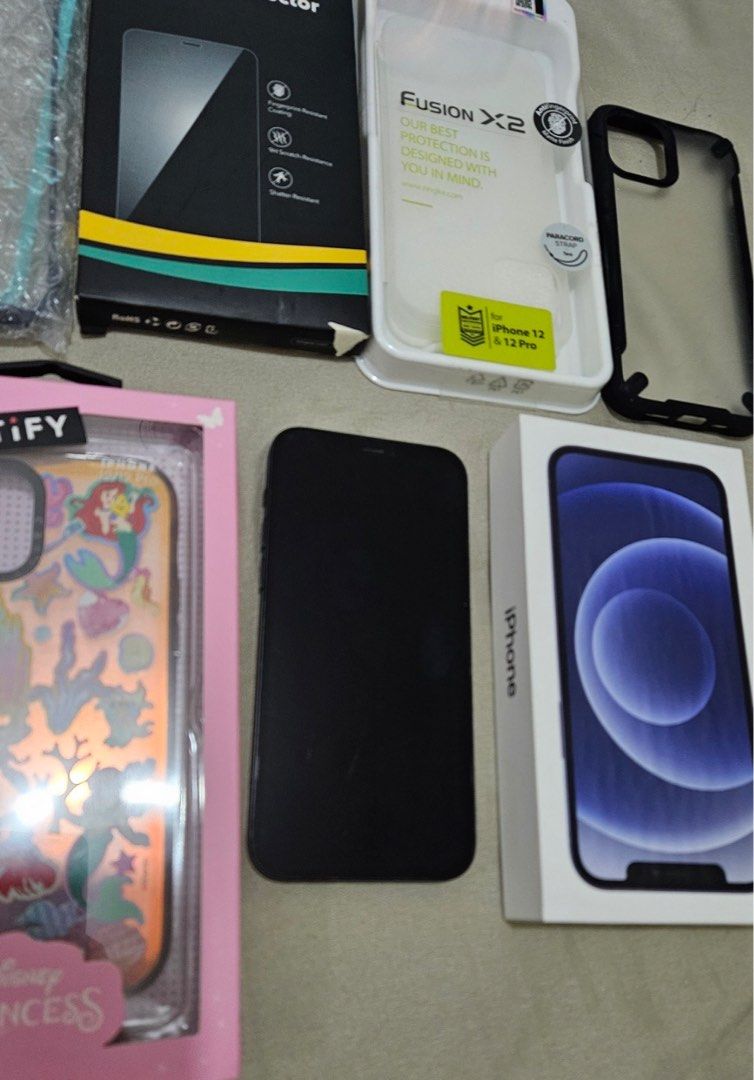 Iphone 12 128gb Lady Owned with box Openline (Category: iPhone 12 Series) located in Caloocan City. Submitted by jane_maze (Listing ID 1286317682, Image 1). Description: Iphone 12 128gb 95% smooth With super minimal hairline scratches Lady owned Same Serial number box and unit With cases Orig casetify disney case No issues Test all you want With box charger Meetup: sm north, trinoma Rfs: upgrade.