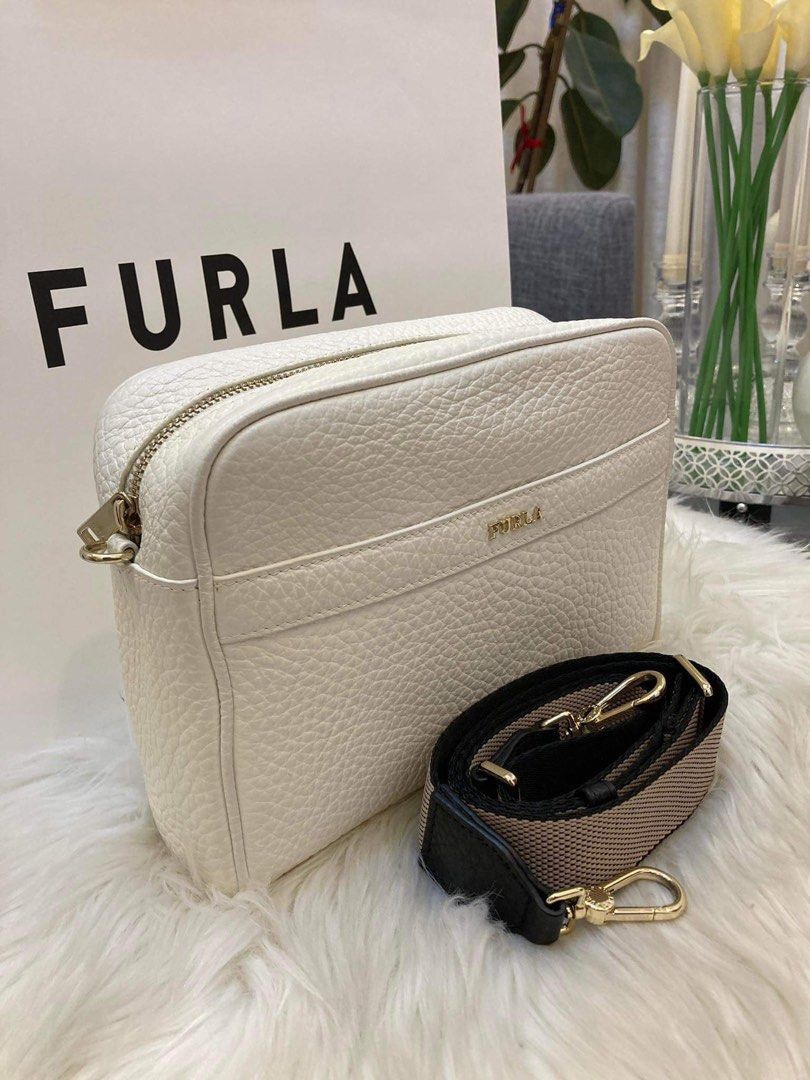💯ORIGINAL FURLA AVRIL CAMERA BAG CHALK (Category: Luxury Bags & Wallets) located in Quezon City. Submitted by ashongsstore (Listing ID 1286273568, Image 1). Description: 🖤FU RLA COLLECTION🖤 🇵🇭ONHAND🇵🇭 New Arrivals ‼️Please look at our pictures as that is exactly what you are purchasing‼️ 💯GUARANTEED ORIGINAL AND AUTHENTIC or TRIPLE YOUR MONEY BACK! Not REPLICA, OEM, TOP GRADE QUALITY, AUTHENTIC QUALITY or Any other Terms to DENOTE FAKE! �