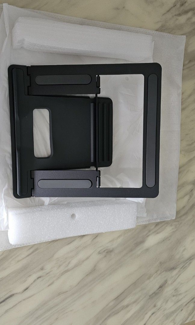 Solid Laptop Stand (Category: Other Accessories) located in Singapore. Submitted by womentreasurespot (Listing ID 1286262601, Image 1). Description: .