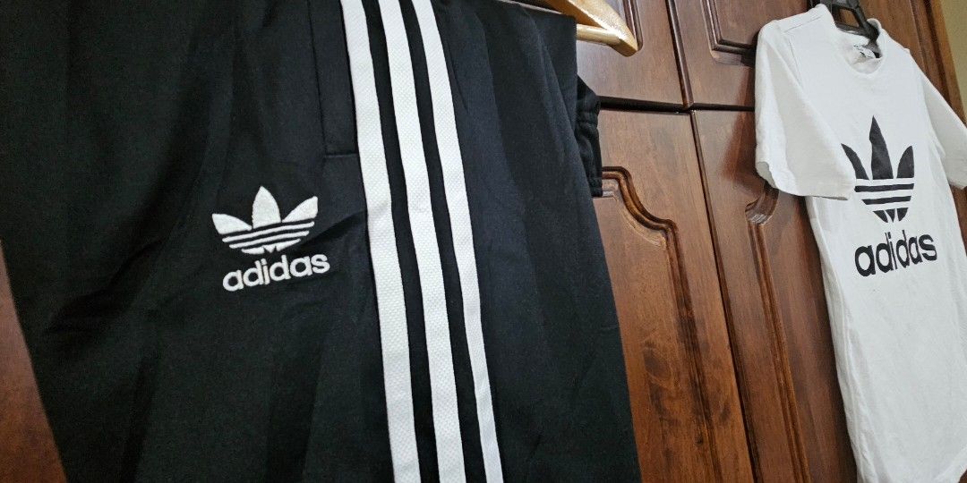 Adidas tracksuit hotsell original vs fake