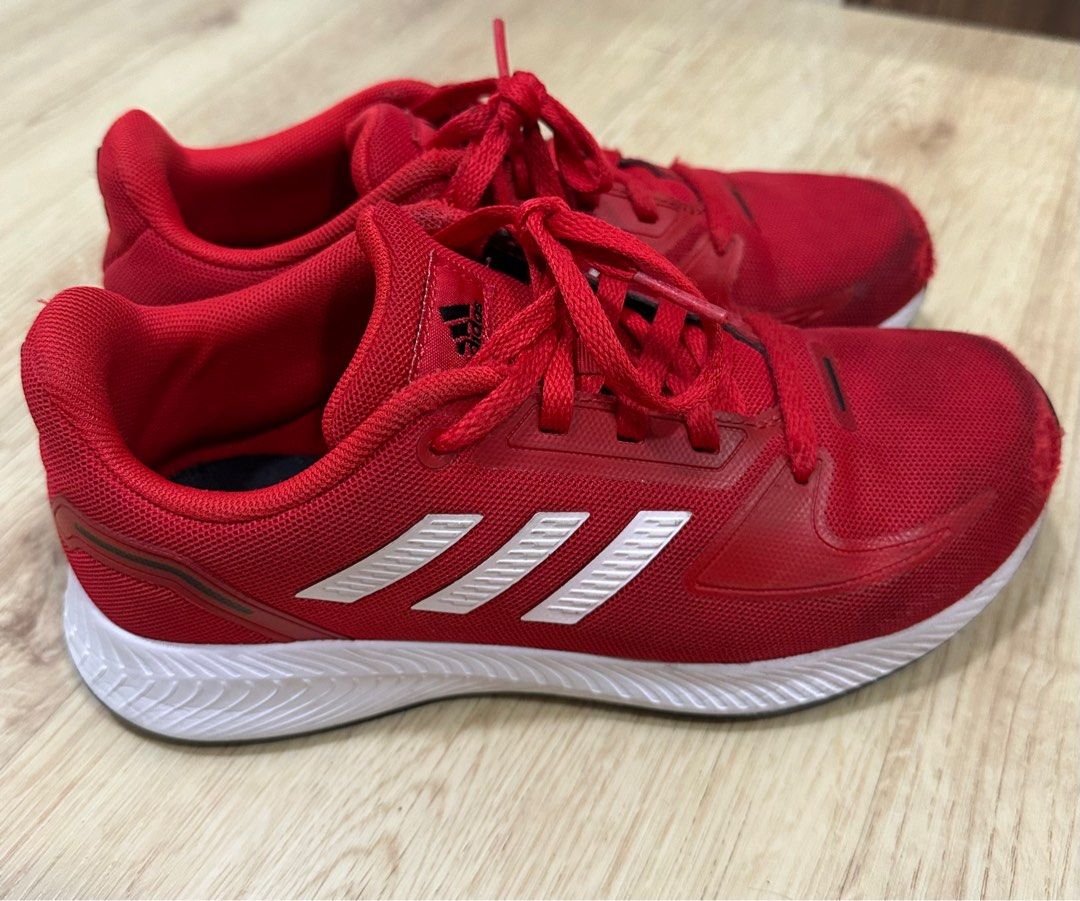 Red color top shoes adidas