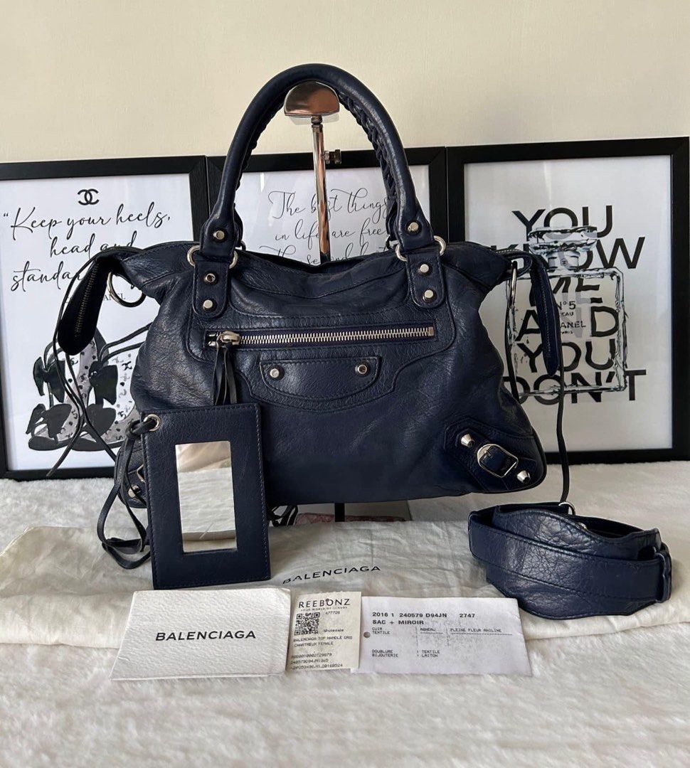 Balenciaga Town Crossbody Bag (Category: Luxury Bags & Wallets) located in Manila. Submitted by bagislifeshop (Listing ID 1286542201, Image 1). Description: ☑️Available in Pampanga ✅Condition: 8.5/10 ✅ Color: Blue in SHW ✅Material: Lambskin leather ✅Inclusion: Dustbag, long strap and mirror .