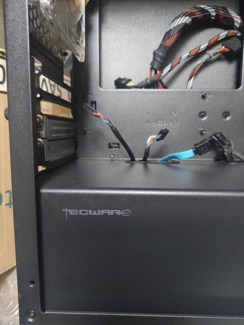 Computer case (Category: Computer Parts) located in Trece Martires City. Submitted by chipmaster74 (Listing ID 1286457879, Image 3). Description: For sale Tecware case with tempered glass, color black. fits M-ATX motherboard and 240mm AIO cooling radiator on top side of case. makinis pa, like new, may kaunti lng dust. used for few months only, already upgraded to bigger case. will include the fans, nasa loob din yun disk tray nya. hindi po kasama
