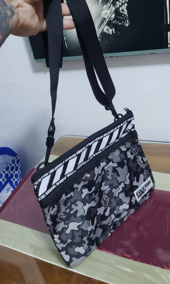 Exile tribe family (Category: Sling Bags) located in Manila. Submitted by mistej (Listing ID 1286541869, Image 3). Description: exile tribe family camou skull and clown design brandnew japan thrifted dimes 11 x 8.